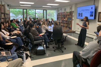 photos of students watching a presenation